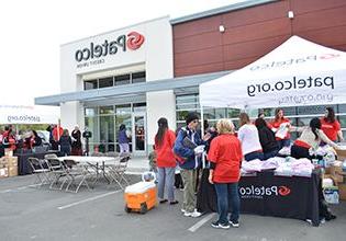 Patelco team members supporting community members in front of the Santa Rosa branch photo